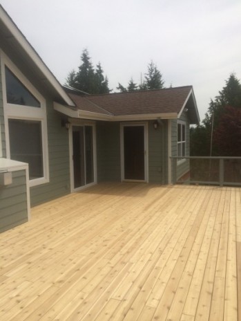 New cedar decking fully installed