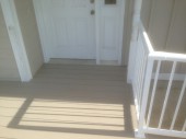 A picture of the where deck and front door threshold meet. It was important to eliminate as many obstacles as possible allowing maximum accessbility.