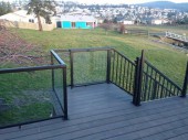 tight knot cedar decking installed with stainless steel screws. This project is located in Anacortes Washington